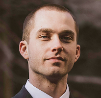 Portrait of Thomas Whitfield, a trading analyst and cryptocurrency market expert